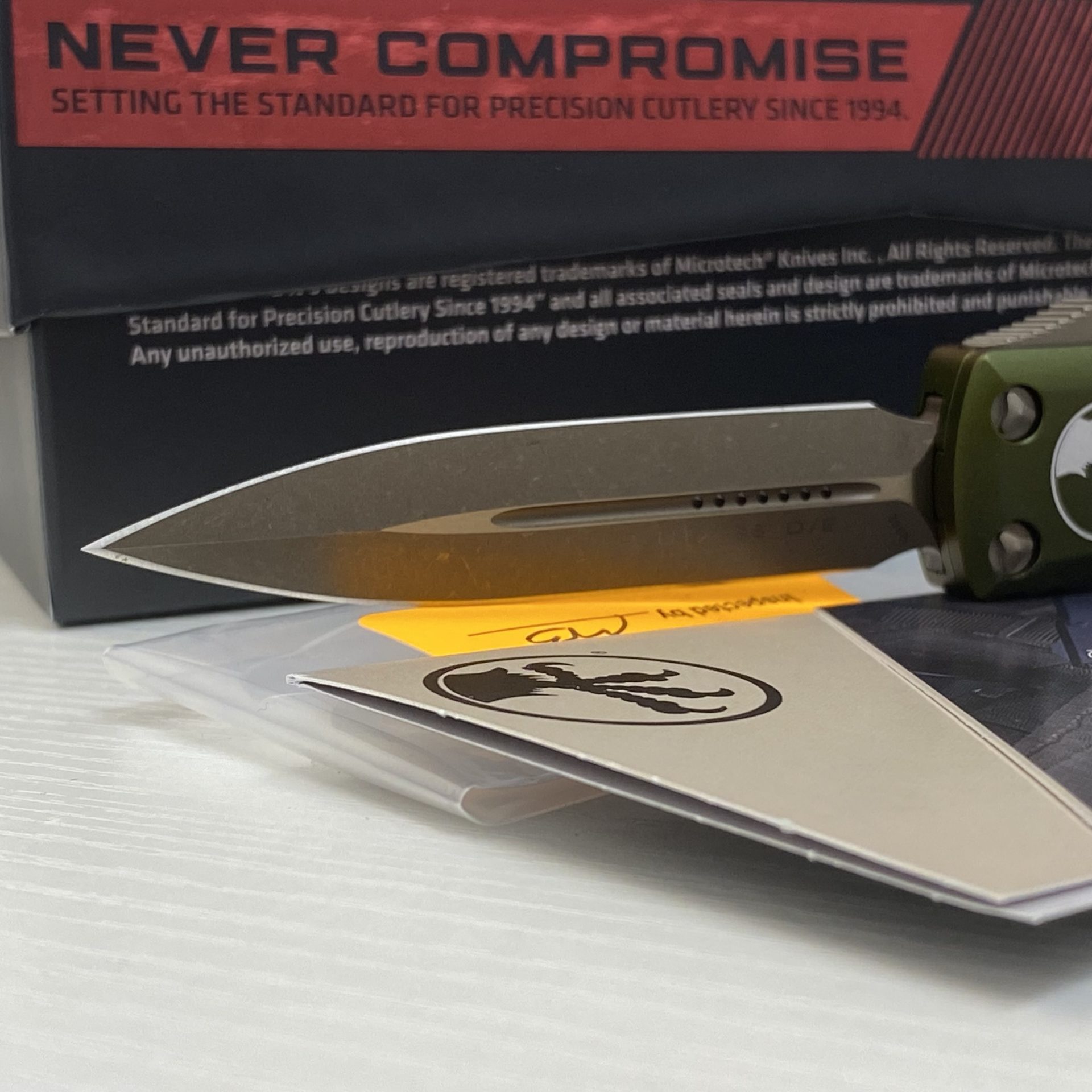 Microtech - 232-13APOD - UTX-85 - OTF Auto - Elmax, M390, 204P Bronze Apocalyptic Dagger - 6061-T6 Aluminum - OD Green - Image 7